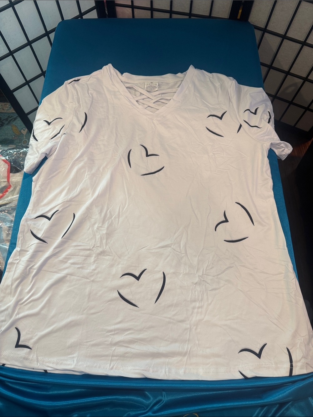 White V-Neck Tee with Black Heart Accents